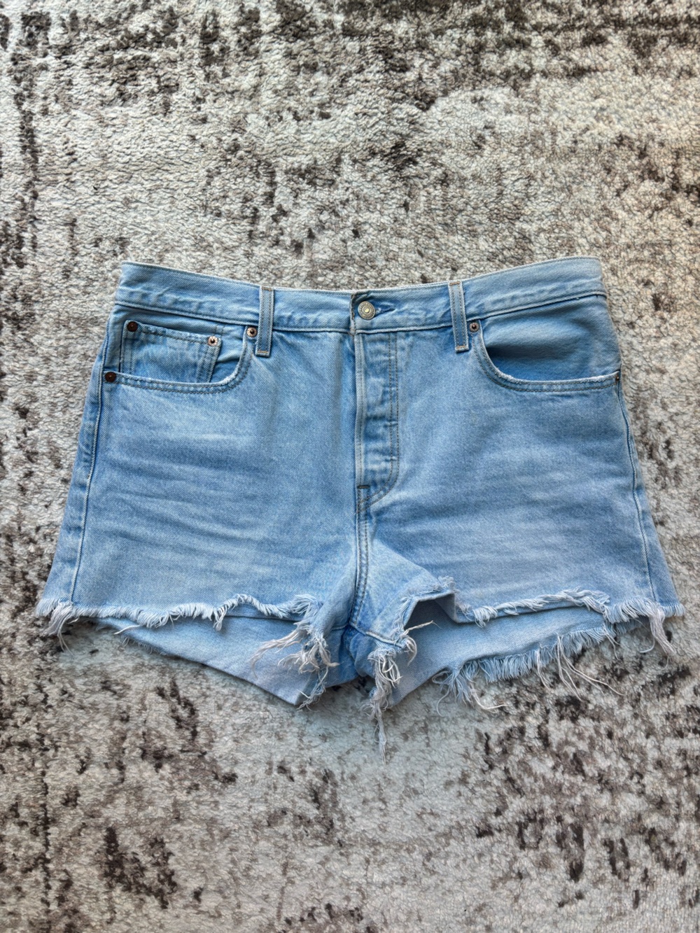 Levi's Light Blue Frayed Denim Cutoff Shorts